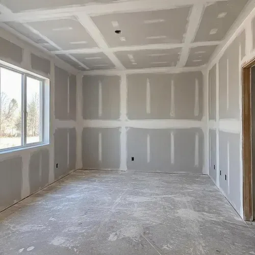 Fully taped room ready for sanding during drywall taping and finishing in Kingston, ON